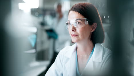 female scientist working in a lab
