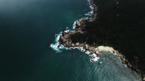 Rocky-Coastline-on-Hainin-Island-in-South-China-Sea,-Aerial-Drone-Landscape