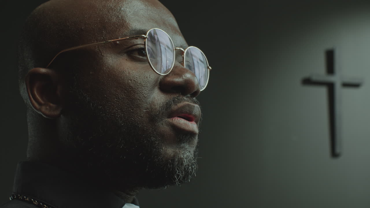Close-Up of Black Pastor Preaching a Sermon in Church