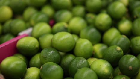 close-up of limes in a market setting