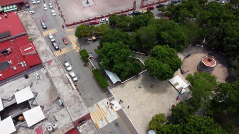 An-aerial-view-of-the-Municipal-Park,-the-Cathedral-and-the-Yucunitza-Hill-in-Huajuapan-de-Leon,-Oaxaca,-Mexico