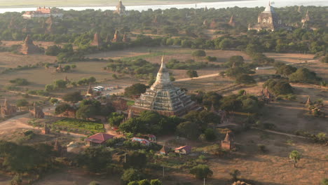 drone dolley shot of the sutaungpyae pagoda during a sunrise in myanmar