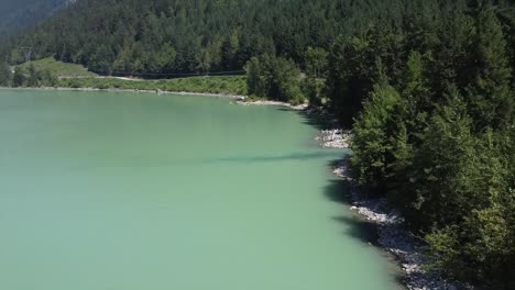 forested rivermouth of lillooet lake in british columbia, canada