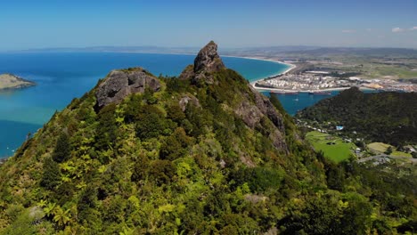 Birds-eye-view-of-rocky-mountain-peak,-Mt-Manaia,-Whangarei-Heads