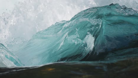 close-up slow-motion shot of the clean whirling crashing water