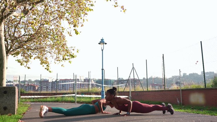 Two women exercising outdoors