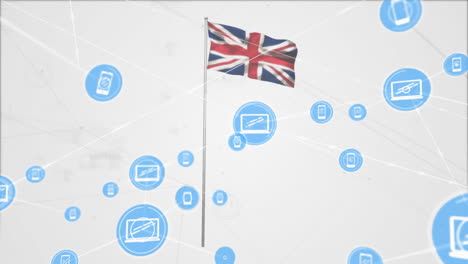 animation of network of computer and smartphone icons over union jack uk flag on white background