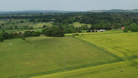 aerial view of crop circle with tractor marks on the field near the potterne village in england, uk