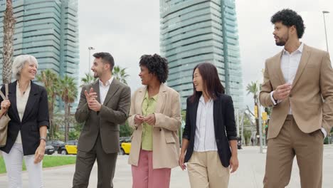 diverse business team walking in the city