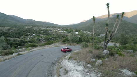 aerial - car starts a road trip in the sierra madre mountains, tamaulipas, mexico