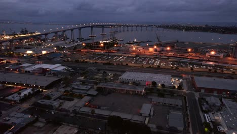 Drone-Shot-showing-the-Coronado-Bridge-at-dusk-in-San-Diego,-California