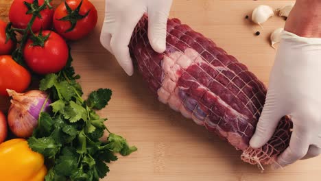 preparing a tied roast beef