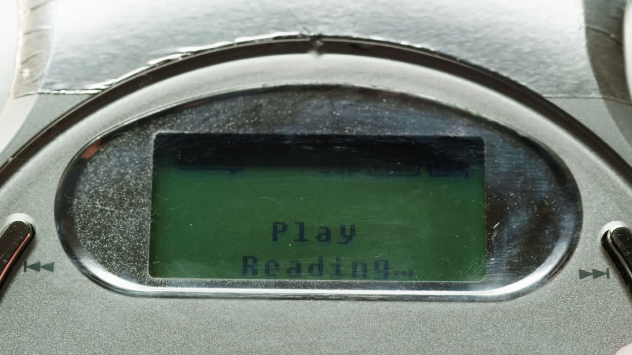 Vintage cd music player close-up. Using portable music player for listening with compact disc