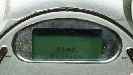 vintage cd music player close-up. using portable music player for listening with compact disc