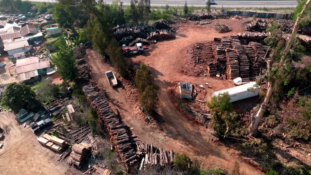 Aerial View Of A Sawmill Facility With Stacked Logs Near Curauma, Chile