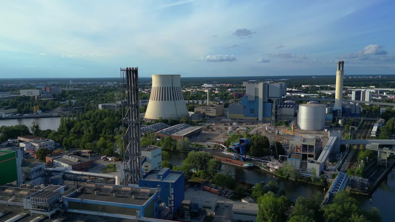 Waste incineration plant, waste to new energy sources, polluting the atmosphere and contributing to climate change. Spectacular aerial view flight drone shot from above