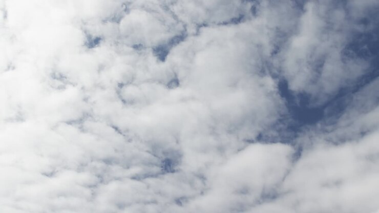 Low angle view of blue sky with clouds