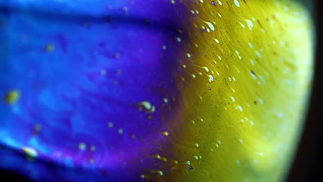 4k stable shots of soap balloons showing the colors of the macro world through a microscope perspective