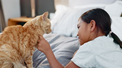 children, bed and a girl petting her cat