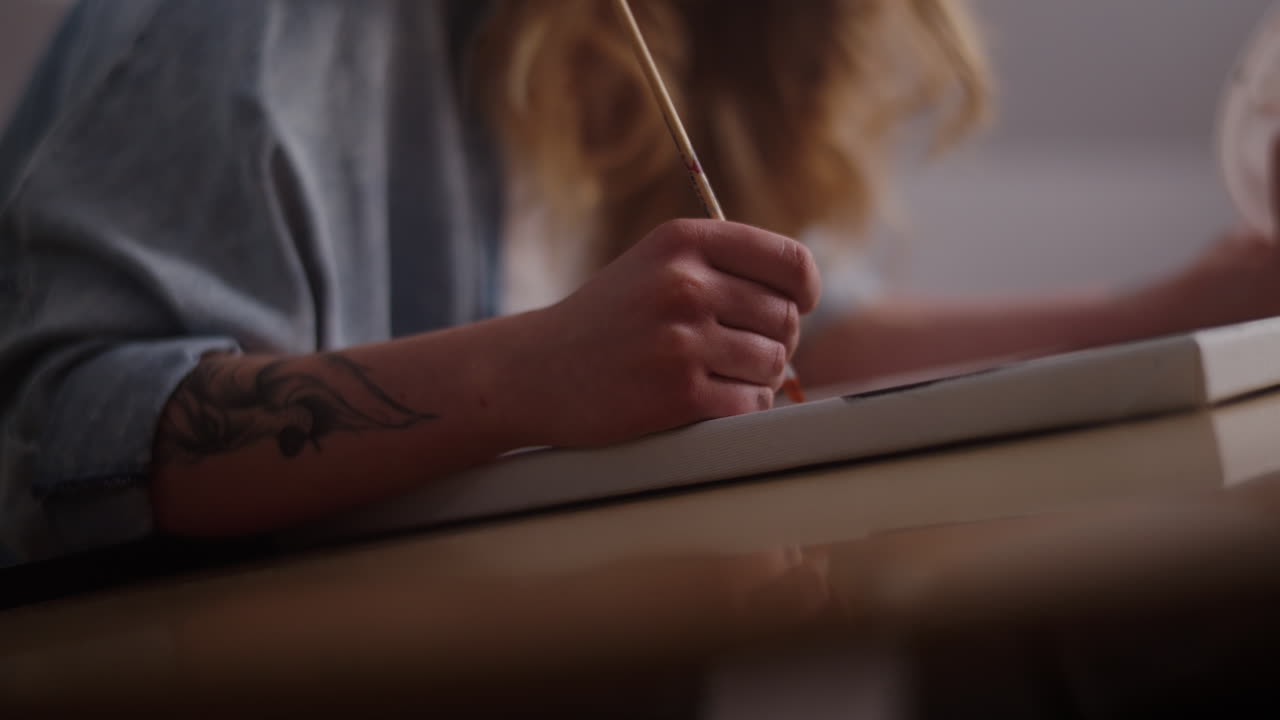 Woman Painting on Canvas