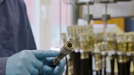 chemical lecturer explaining students hydraulic hose in lab of university,close up shot