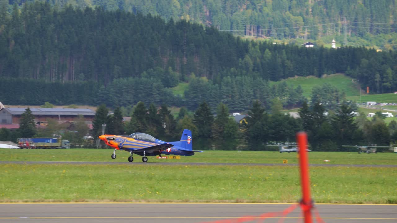 Aerobatic pilot taxis over the runway at Airpower 2024 in Austria
