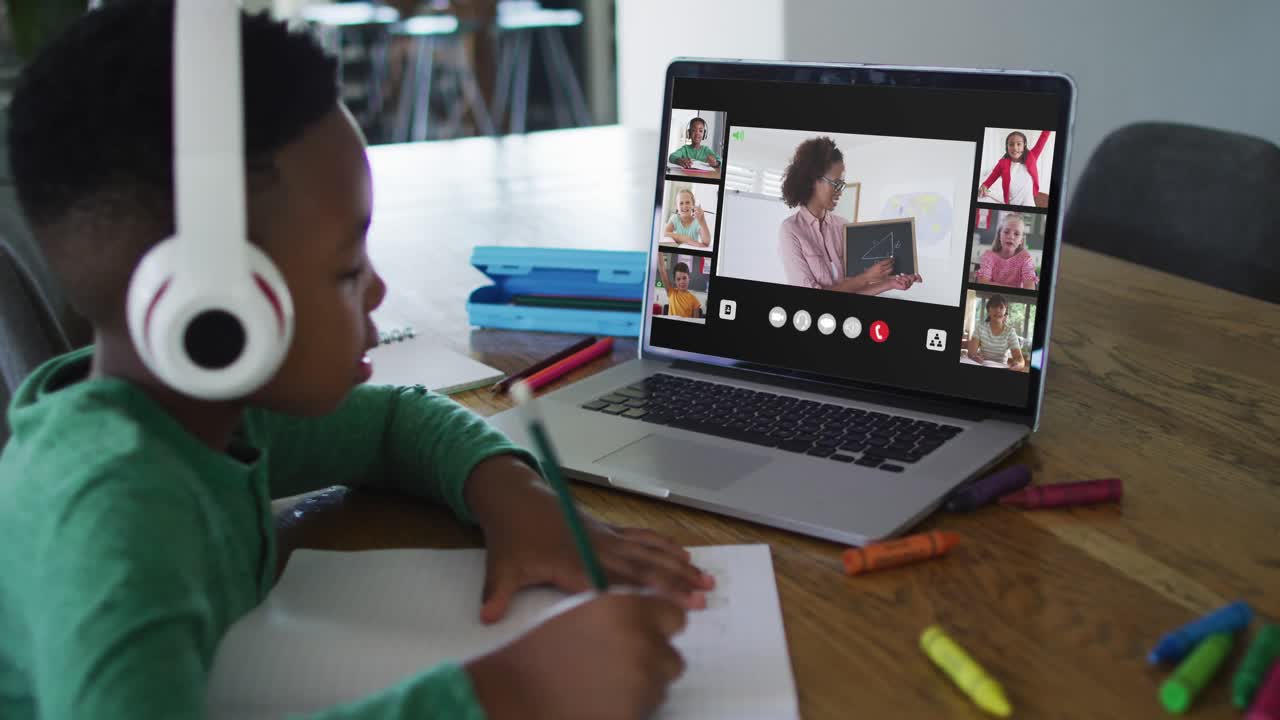 Composite video of boy using laptop with interface of diverse class and teacher in online lesson
