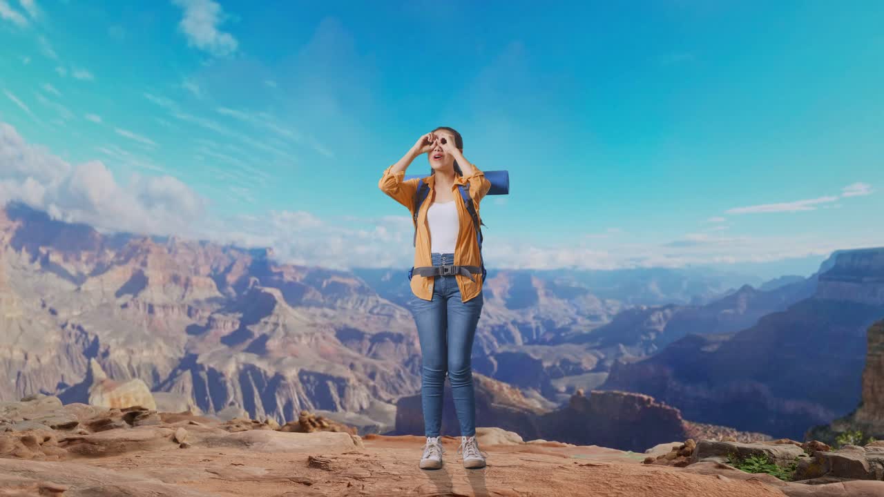 Full Body Of Asian Female Hiker With Mountaineering Backpack Making Binoculars Gesture Looking At Something Then Saying Wow While Traveling At The Top Of Mountain