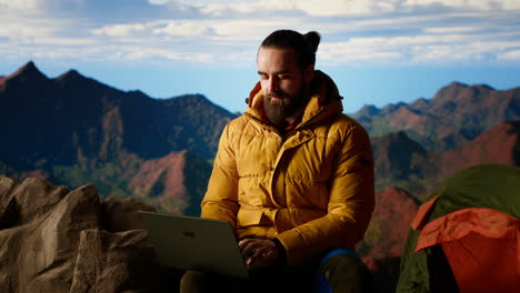 modern online entrepreneur with technology reliance on a mountain top