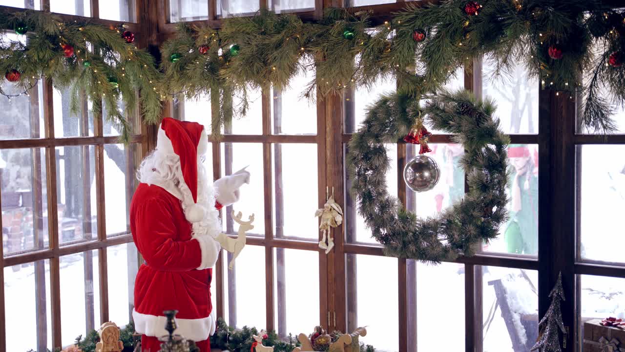 Santa Claus decorated room. Santa Claus in room decorated for Christmas