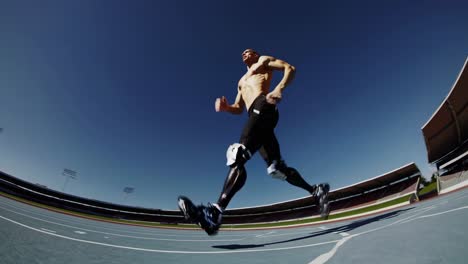 paralympic athlete running on track