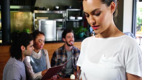 Waitress-taking-order-from-customers