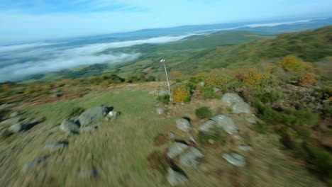 Drone-Volando-Alrededor-De-Manga-De-Viento-O-Cono-De-Viento-O-Manga-De-Viento,-Uchon-En-Francia