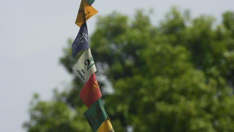 tibetan flag in air - omm