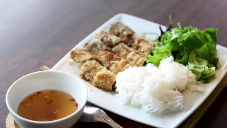 traditional vietnamese meal with dipping sauce