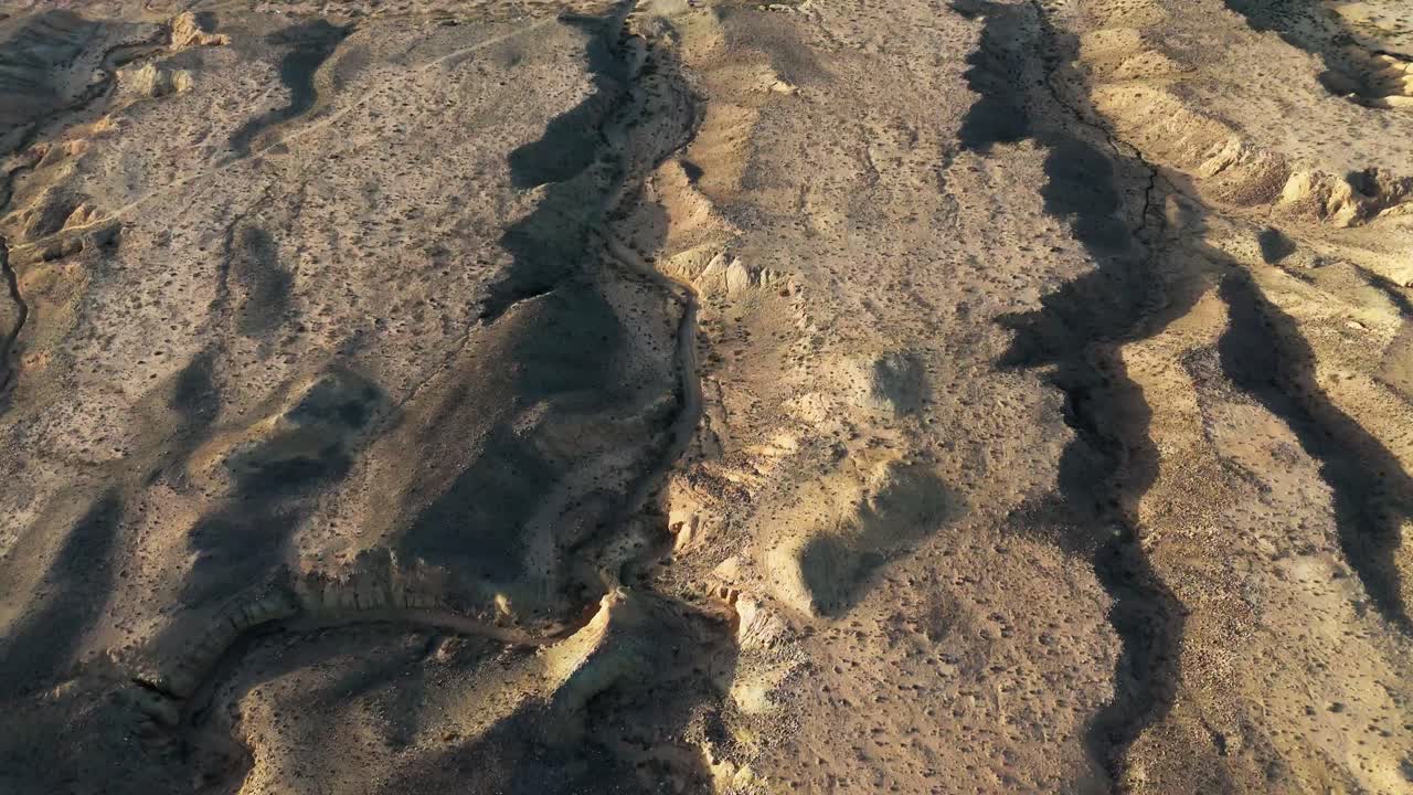 Aerial top down pattern of rock formation in Ak Sai Canyons The Valley of Forgotten Rivers Kyrgyzstan
