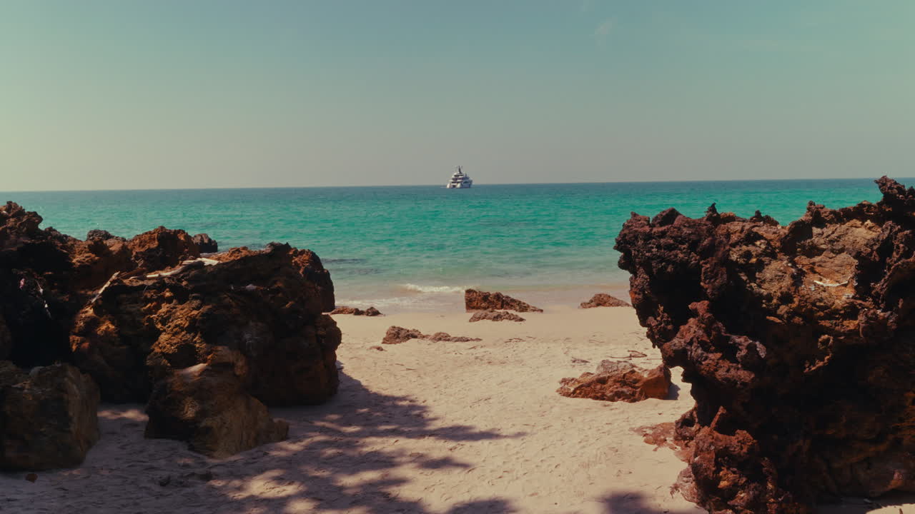 Tropical Beach with Yacht