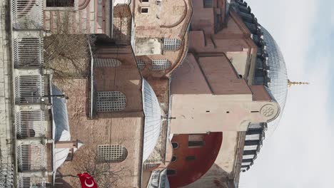 hagia sophia and turkish flag in istanbul, turkey
