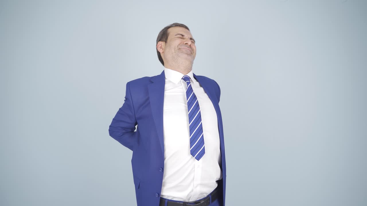 허리 통증이 있는 사업가입니다.