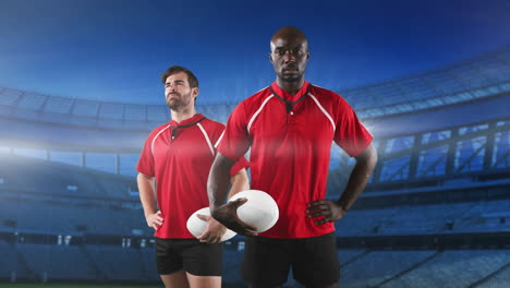 jugadores profesionales de rugby de pie frente a un estadio