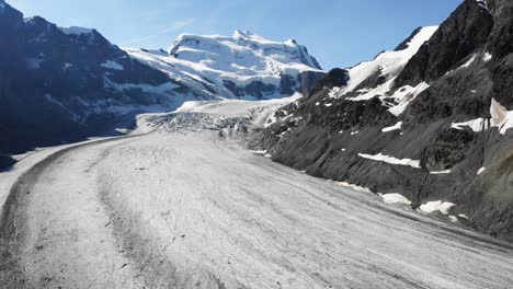 morning aerial flyover over corbassiere glacier in valais, switzerland