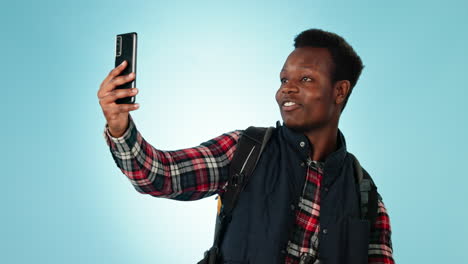 Hiking,-video-call-and-black-man-with-backpack