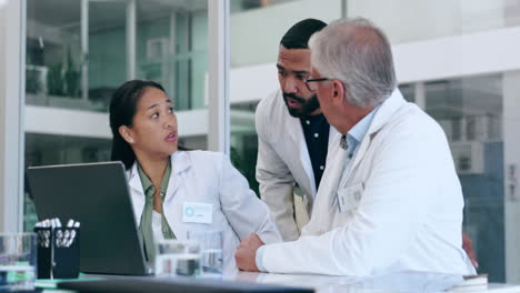 Team,-meeting-and-doctors-with-a-laptop