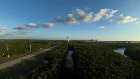 4K-aerial-footage-of-Bonita-Beach,-Florida-water-tower