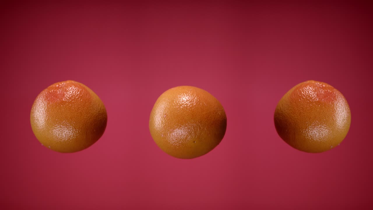 pomelas frescas lanzadas simultáneamente volando colgando en el aire y cayendo