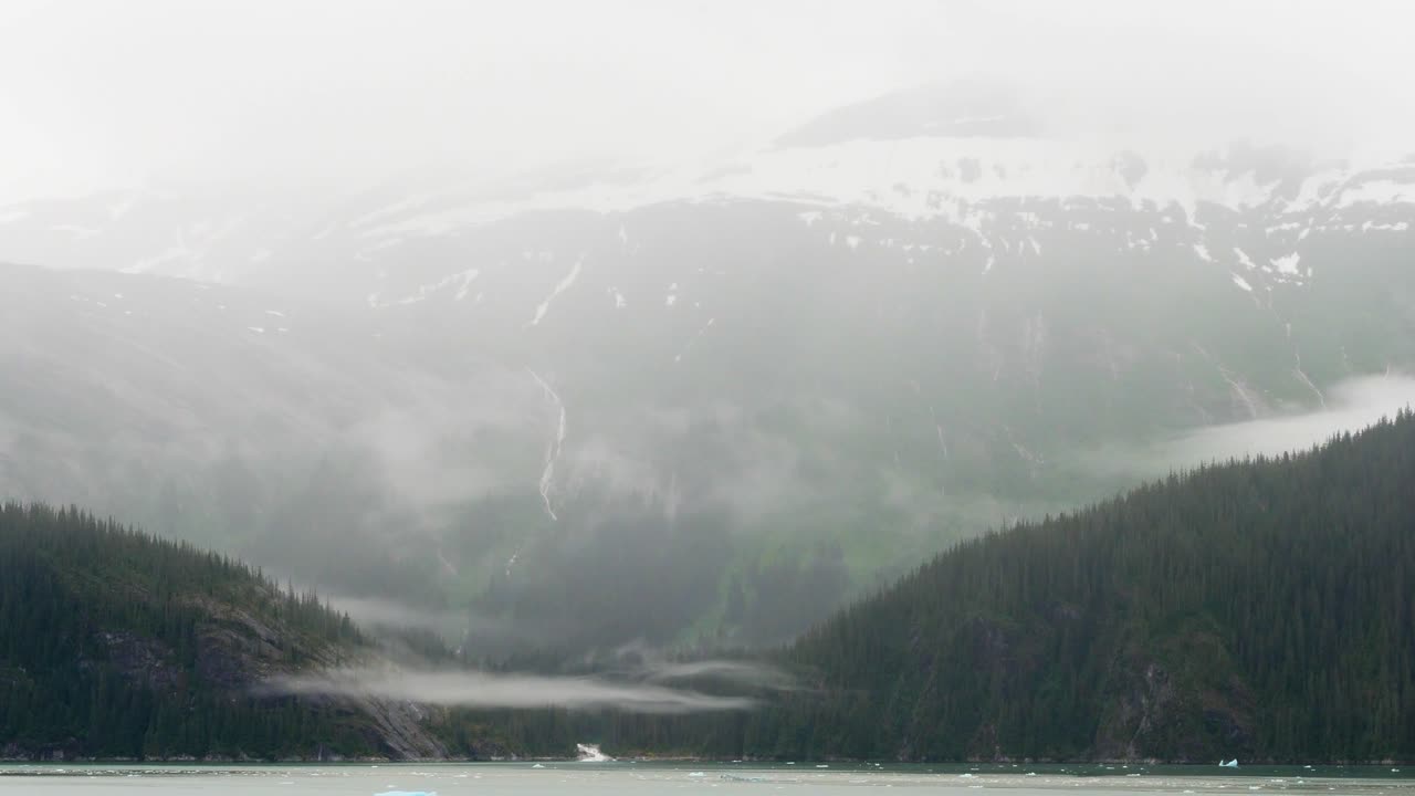Sailing down on Endicott Arm fjord, Alaska.Holkham Bay, stunning views in a foggy morning.