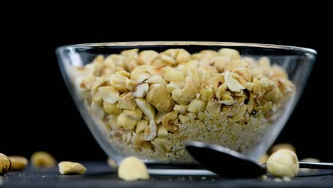 chopped hazelnuts on a rotating plate (seamless loopable)