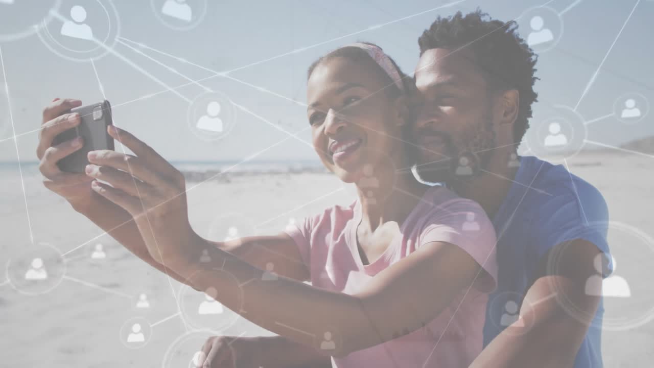 couple clicking smartphone shutter beachside, generating social media icons expanding connectivity