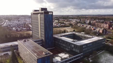 Aerial-view-Pilkington's-glass-head-office,-a-modern-blue-high-rise-with-shared-office-space