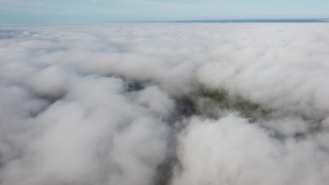 mist fog clouds from above aerial view over